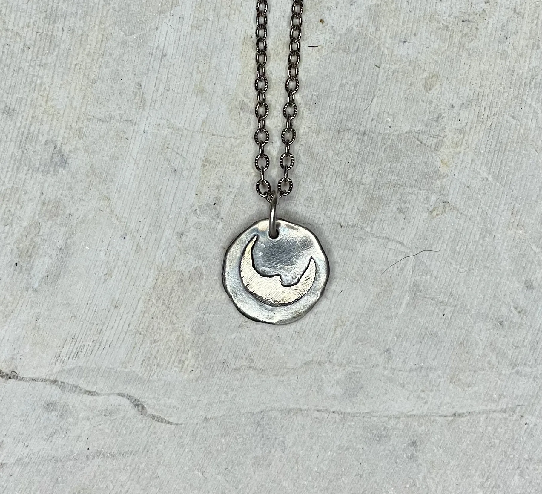 N40- Tiny Talisman Sterling Crescent Moon